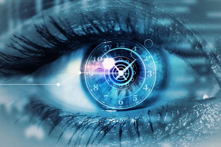 An eye beside a clock