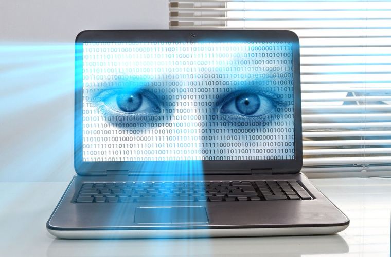 A person watching a series on a laptop